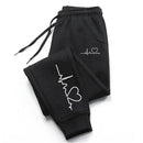 Calça Feminina Jogger Coração Estampado | Moletom Casual Premium Confortável e Quente para Academia, Passeio e Dia a Dia